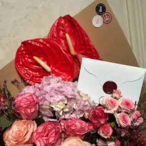 Red Velvet Heart Bouquet with red anthuriums, roses, and gerbera daisies for a romantic gift